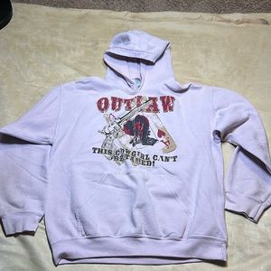 Pink outlaw sweater